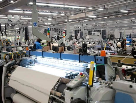 Why should I use a project management professional service in my textile factory?